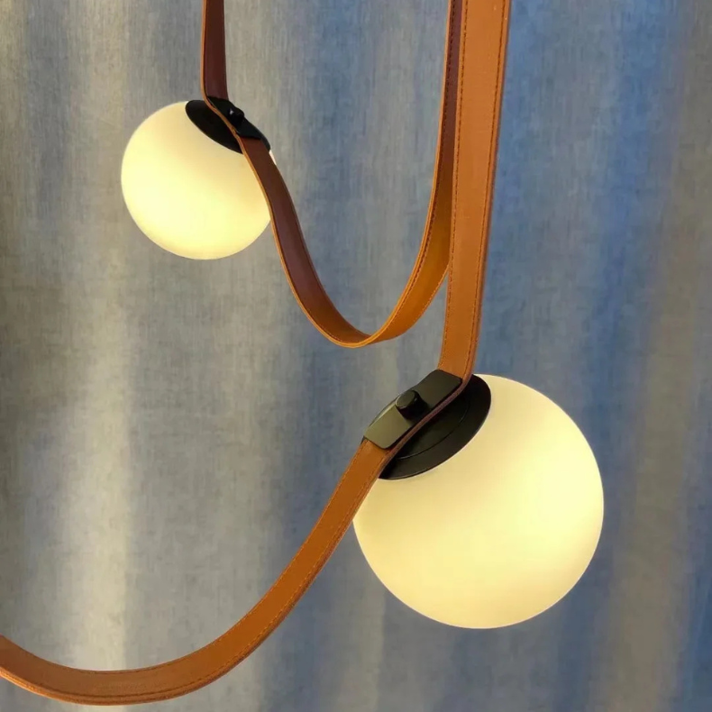 Tura | Suspension Design Sphères en Verre et Cuir G9 Lustre Moderne Cascades